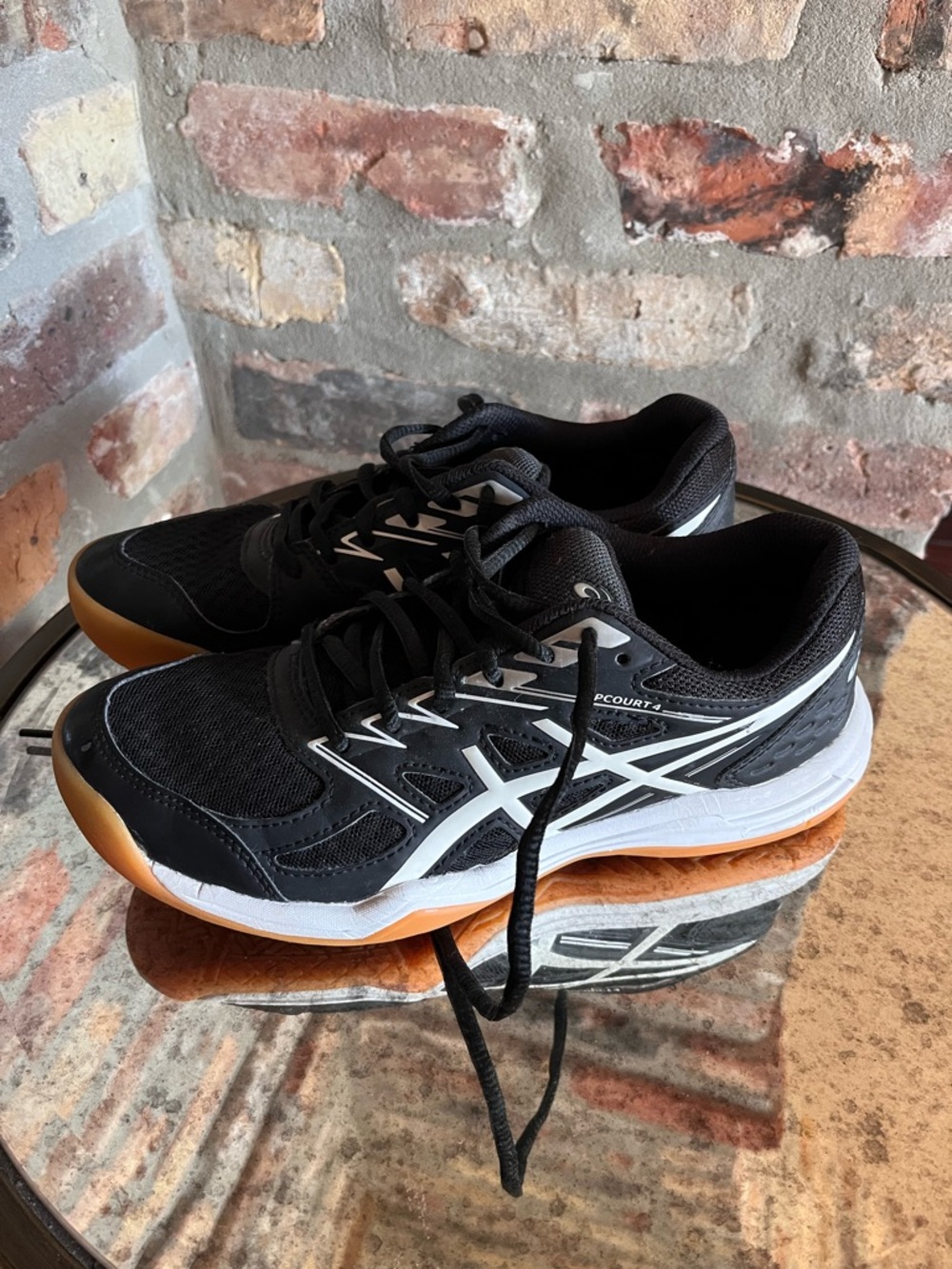 ASICS women’s Black and White Court / volleyball Shoes size 7